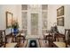 Elegant foyer with hardwood floors, decorative glass door, and classic furnishings at 7 W Andrews Nw Dr, Atlanta, GA 30305