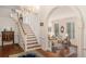 Grand foyer with staircase, hardwood floors, and access to formal living spaces at 7 W Andrews Nw Dr, Atlanta, GA 30305