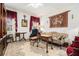 Cozy sitting room features a decorative rug, antique furniture, and a tapestry at 7 W Andrews Nw Dr, Atlanta, GA 30305
