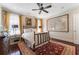 Bedroom with hardwood floors, a bed, and a framed wall map art piece at 2220 Edison Ave, Atlanta, GA 30305