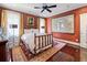 Bedroom with large map and hardwood floors at 2220 Edison Ave, Atlanta, GA 30305