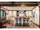 Bright, updated kitchen with central island, bar stools, stainless hood and built in bench seating at 2220 Edison Ave, Atlanta, GA 30305