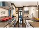 View of modern kitchen with long counters, stainless steel appliances, and dark wood trim at 2220 Edison Ave, Atlanta, GA 30305