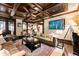 Living room with hardwood floors, coffered ceiling, and a fireplace at 2220 Edison Ave, Atlanta, GA 30305