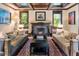 Living room with hardwood floors, coffered ceiling, and a fireplace at 2220 Edison Ave, Atlanta, GA 30305