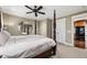 Primary bedroom featuring a four-poster bed and view into kitchen at 2220 Edison Ave, Atlanta, GA 30305