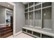 Well-organized mudroom with custom shelving, hooks, and bench seating near the stairs at 2220 Edison Ave, Atlanta, GA 30305