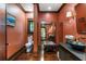 Sophisticated powder room, with dark wood accents and a black sink at 2220 Edison Ave, Atlanta, GA 30305