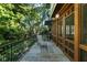 Relaxing screened porch with stone floor and wooded view at 2220 Edison Ave, Atlanta, GA 30305