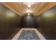 Finished wine cellar with wood ceiling and area rug at 2220 Edison Ave, Atlanta, GA 30305