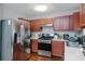 Stainless steel appliances and wood cabinets in this kitchen at 30 Springbottom Dr, Lawrenceville, GA 30046