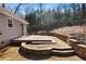 Deck and backyard with retaining wall and woodsy view at 3001 Scott Rd, Marietta, GA 30066