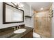 Updated bathroom with granite vanity and a large walk-in shower at 3001 Scott Rd, Marietta, GA 30066