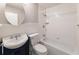 Updated bathroom with white subway tile and a navy blue vanity at 3001 Scott Rd, Marietta, GA 30066