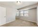 Spacious bedroom with neutral walls, carpet, and mirrored closet doors at 3001 Scott Rd, Marietta, GA 30066