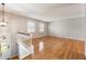 Spacious living room with hardwood floors and neutral walls at 3001 Scott Rd, Marietta, GA 30066