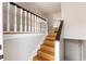 Wooden staircase with white railing and hardwood floors at 3001 Scott Rd, Marietta, GA 30066