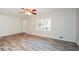Spacious living room with hardwood floors and freshly painted walls at 3667 Humphries Hill Rd, Austell, GA 30106