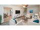 Open-concept living room with view into dining area, and stairs to the second floor at 3667 Humphries Hill Rd, Austell, GA 30106