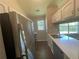 Kitchen with stainless steel appliances and white cabinets at 6048 Old Wellborn Trce, Lithonia, GA 30058