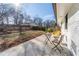 Private patio with small table and chairs, great for relaxing at 6856 Womack Ct, Peachtree Corners, GA 30360