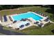 Community pool with separate kiddie pool and ample lounge space at 6856 Womack Ct, Peachtree Corners, GA 30360