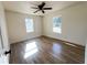 Light-filled bedroom with hardwood floors and large windows at 1045 Ridgecrest Se Dr, Smyrna, GA 30080