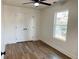 Bright bedroom featuring hardwood floors and a spacious closet at 1045 Ridgecrest Se Dr, Smyrna, GA 30080