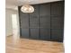 Bright dining room with a dark accent wall and hardwood floors at 1045 Ridgecrest Se Dr, Smyrna, GA 30080