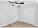 Spacious bedroom with double closets and wood-look flooring at 2918 Fields Dr, Lithonia, GA 30038