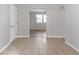 Spacious dining room with tile floors at 3589 Satellite Blvd, Ellenwood, GA 30294