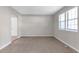 Spacious dining area with tile flooring and large windows at 3589 Satellite Blvd, Ellenwood, GA 30294