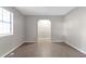 Simple living room with tile floors and natural light at 3589 Satellite Blvd, Ellenwood, GA 30294