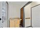 Mud room featuring a storage cabinet and access to the outdoors at 450 Surveyors Pt, Suwanee, GA 30024