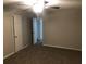 Spacious bedroom with ceiling fan and neutral decor at 1079 Salisbury Trl, Riverdale, GA 30296