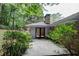 Backyard view of house with patio and landscaping at 3449 Palace Ct, Tucker, GA 30084