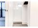 Small shower stall with white tile and step at 958 Moda Dr, Atlanta, GA 30316