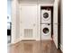 Stackable washer and dryer in a closet at 958 Moda Dr, Atlanta, GA 30316