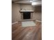 Finished basement featuring a cozy stone fireplace at 2320 Cherokee Valley Dr, Lithonia, GA 30058