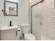 Clean bathroom with white subway tile and glass shower at 265 Whitaker Nw Cir, Atlanta, GA 30314