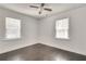 Bright bedroom with dark hardwood floors and ceiling fan at 265 Whitaker Nw Cir, Atlanta, GA 30314