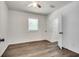 Spacious bedroom with ceiling fan and hardwood floors at 265 Whitaker Nw Cir, Atlanta, GA 30314