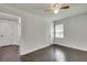 Spacious bedroom with dark hardwood floors and ceiling fan at 265 Whitaker Nw Cir, Atlanta, GA 30314