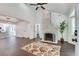 Spacious living room with whitewashed brick fireplace and hardwood floors at 265 Whitaker Nw Cir, Atlanta, GA 30314