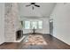 Bright living room featuring hardwood floors, bay window, and fireplace at 265 Whitaker Nw Cir, Atlanta, GA 30314