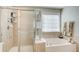 Bathroom featuring separate tub and shower at 4694 Wehunt Commons Se Dr # 25, Smyrna, GA 30082