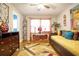 Cozy bedroom with a warm color scheme, hardwood floors, and ample natural light at 218 Ward Rd, Ellenwood, GA 30294