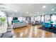 Expansive living area offering abundant natural light, stylish decor, and a modern open layout at 218 Ward Rd, Ellenwood, GA 30294