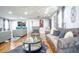 Spacious living room with hardwood floors, modern decor, and comfortable seating options at 218 Ward Rd, Ellenwood, GA 30294