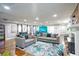 Expansive living room with hardwood floors, comfortable sofas and a large accent rug at 218 Ward Rd, Ellenwood, GA 30294